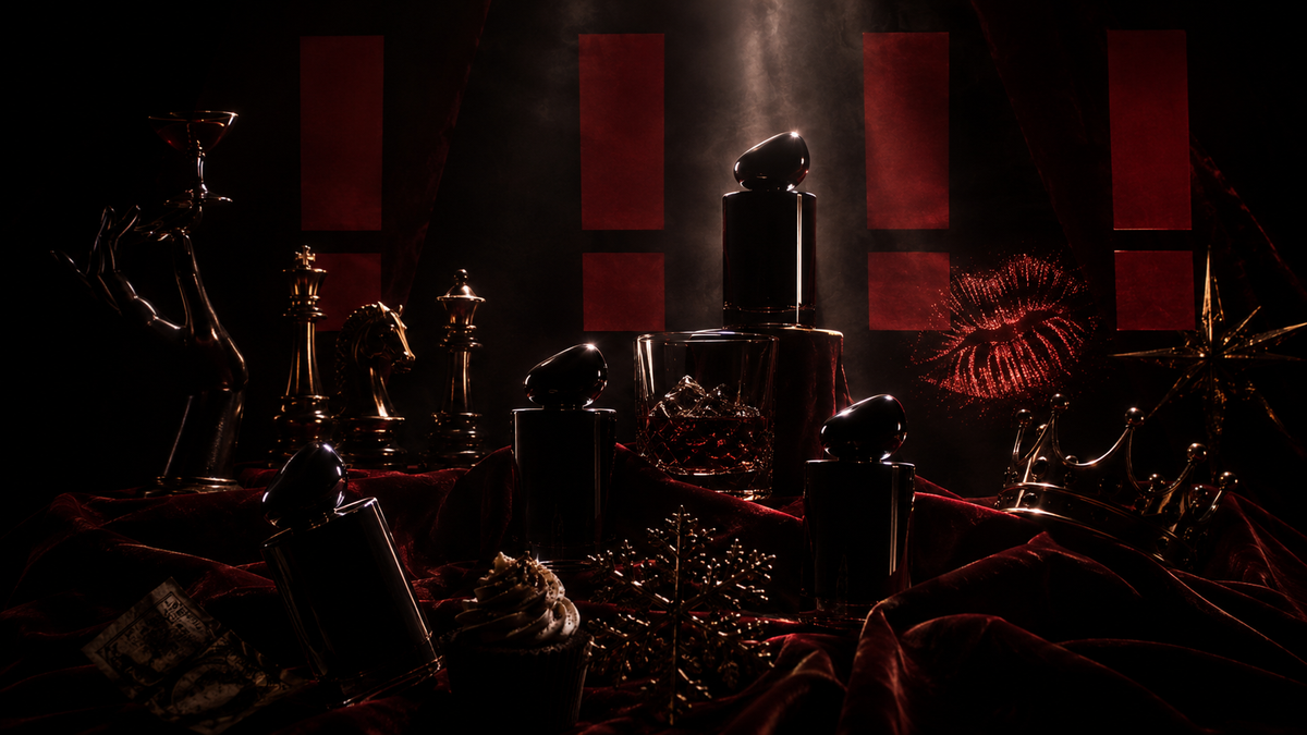 The Rizz Club perfume bottles displayed on a dark, dramatic table setting — premium Extrait de Parfum, be charizzmatic